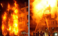 Bomberos apagando fuego en un edificio con sistema SATE