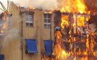 Edificio con sistema de fachada ventilada en llamas
